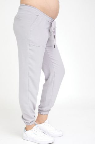 איזה לובשת מכנסי הריון אפורים של אבישג ארבל