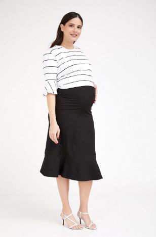 אישה לובשת חצאית הריון אדלה שחורה - אבישג ארבל