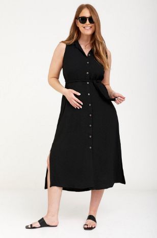 אישה לובשת שמלת הריון מארון שחורה