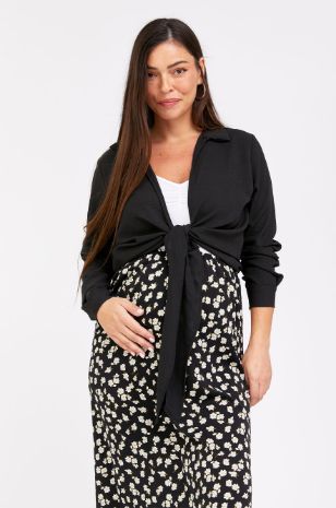 רוני דלומי לובשת חולצת קשירה גברית לבן	