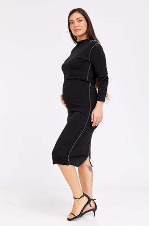 רוני דלומי לובשת חצאית הריון גאיה שחורה