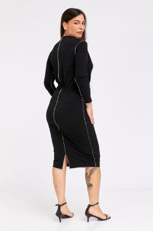 רוני דלומי לובשת חצאית הריון גאיה שחורה